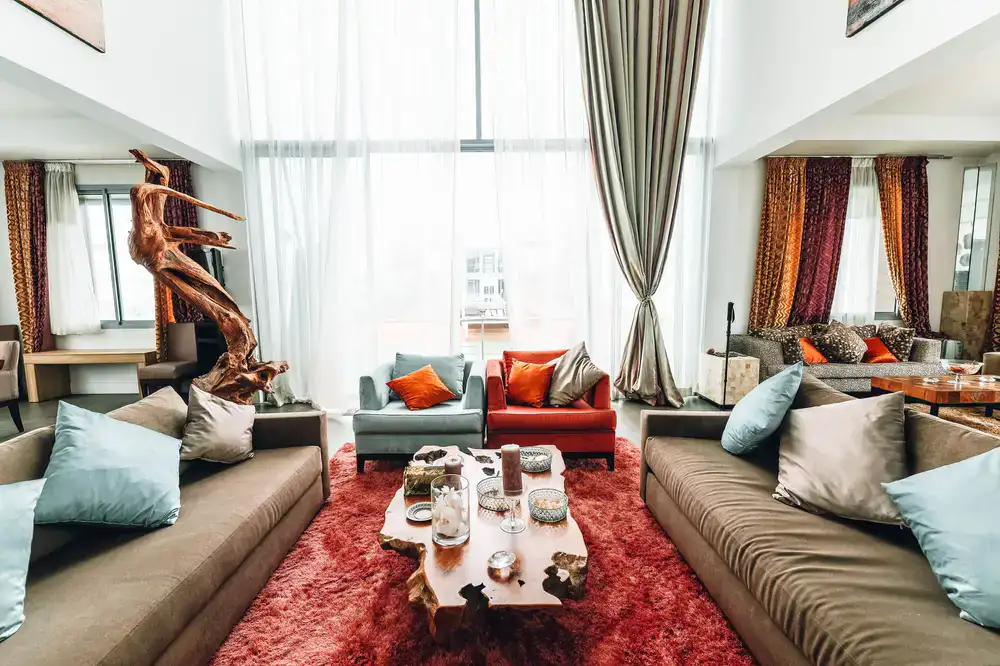 Living room furniture collection featuring fabric sofas and wood center tables